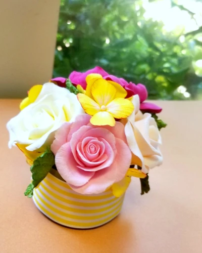 Artist Julia Dogan creates beautiful air dry clay flower bouquets with Hearty Clay.